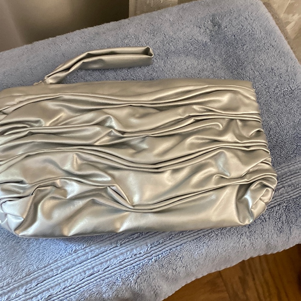 Elizabeth Arden silver clutch or make up bag